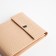 Women's wallet on the button, beige color