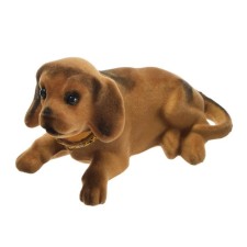 Dog on a car panel shocking his head, a large, brown color