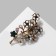 Brooch "Flowers" on a twig, the color emerald-radiant in black gold