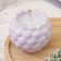 Candle "Shar" in the candlestick with spherical faces of gypsum, 8x7 cm, marble with purple. strip