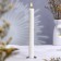 Candle-cylinder with faces, 25x3.5 cm, white, 10 hours
