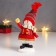 Polystone souvenir "Snowman in a red fur coat, striped cap and scarf" 14x10.5x5 cm