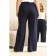 Women's costume: cardigan, trousers, size 50, black color