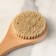 Massage brush made of natural bristles, with a handle, smooth