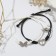 Bracelets "Uenubles" on a magnet, a heart with a butterfly, the color is black and white