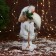 Santa Claus "with a curly beard, in a fur suit" 28 cm, white