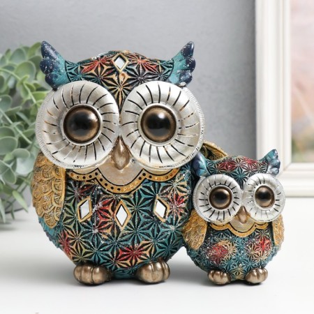Polystone souvenir "Eagle owl with a hood, blue-red snowflakes" sparkles 16.5x8x16 cm