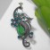Brooch "Peacock" elegant, color in black silver