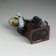 Piglite Polystone "The Snake Dark Snow at the safe" 8.3x5.3x11.2 cm