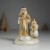 Polystone candlestick "Santa Claus in a brown fur coat with a snowman" d = 3? 5 cm 10.3x9.8x14 cm