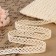 Knitted lace, 15 mm × 15 ± 1 m, beige color