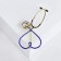 Brooch "Stethoscope" heart, blue color in gold