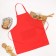 The apron is saved and the color is red, 65*75 cm, 100% p/e