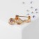 Brooch "Violin key" mini, inspiration, white-purple color in gold