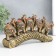 Polystone souvenir "Five elephants on a tusk with flowers" Bronze 20.5x4x11 cm