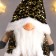 Interior doll "Santa Claus in a gold cap and a vest with sequins" 55x16x22 cm