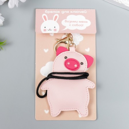 A keychain to the leatherette with carbine "Puccum Glazai Pig" 10x7.6 cm