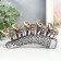 Polystone souvenir "Five elephants on a tusk with flowers" silver 17x4x8 cm