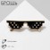 Brooch "Glasses" in pixels, black color in gold