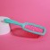 The comb is massage, wide, ventilated, 8.5 × 20.5 cm, PVC box, turquoise/pink color