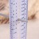 A ruler to determine the size of the knitting needles, 14 cm