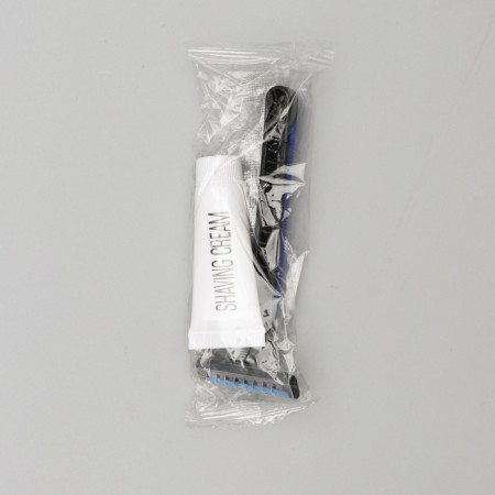 A razor of extras with two stainless blades with a moisturizing strip, shaving cream10 gr.-1