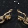 Earrings with “evening” rhinestones, rounded, white color in gold