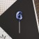 Candle for the cake, the number "6", blue.