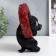 Souvenir Polystone Light "Black dog hid in the wheel" from the sun. Battery 19.5x11x13.5 cm