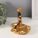 Souvenir Polystone stand "African Adeol in a dress with hem" Gold 11x16x14 cm