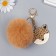 Fluffy on a ring with a carbine, metal "Leopard" Beige 12x6.5 cm