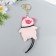 A keychain to the leatherette with carbine "Puccum Glazai Pig" 10x7.6 cm