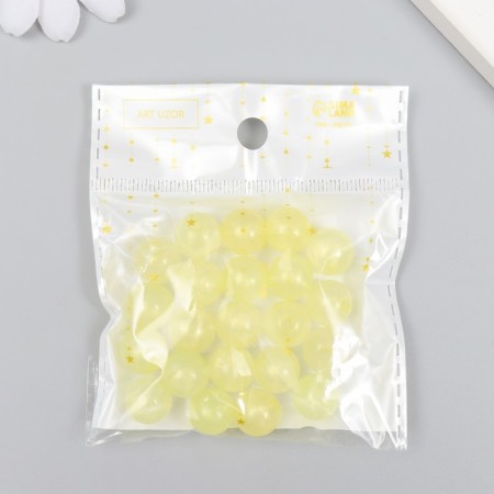 Plastic beads "Balls light yellow with sparkles" glow in the dark set of 20 g d = 1.2 cm-3