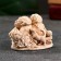 Figure "On the Flood" ivory, 7x6x8cm
