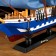 The ship is a souvenir average "horseman", the sails are blue, mix, 43x8.5x39 cm