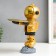 Souvenir Polystone Stand "Cosmonaut on Asteroid" Golden 29x17x22.5 cm