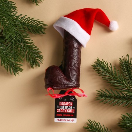 The XXL lollipop in the cap “The gift still needs to be earned”, the taste: Cola, 140 g.