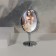 Mirror on the leg "Oval", bilateral, with an increase, mirror surface 9.4 × 11.5 cm, silver color