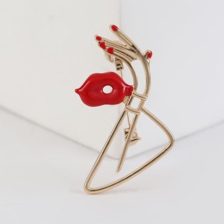 Brooch "Silhouette", red color in gold