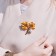 Brooch "Maple leaves", color in gold