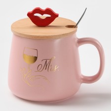 Ceramic mug with a spoon 