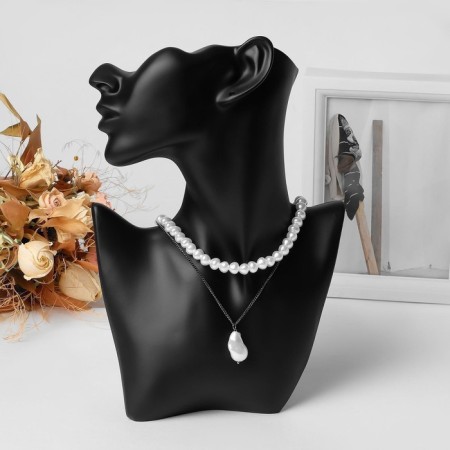 A bust for jewelry, half a face, a hole for an earring, 18 × 7 × 28, black color-1