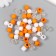 Plastic beads "Crystal polyhedron. Orange, white, transparent" set 30 g 1x1x1 cm