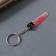 Acryl key a mirror "bloodied saw" 5.1x1.3x0.3 cm