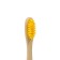 Middle bamboo toothbrush in the box, yellow