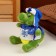 Soft toy "Dragon", in a sweater with a snowflake, 17 cm, green color