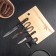A set of kitchen supplies, 5 objects: knives 9.2 cm, 15.2 cm, vegetable cleaning, scissors, board, black color