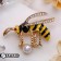 Brooch "Bee" with bead, color in gold