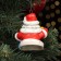 Fir -tree porcelain toy "Santa Claus with a clock", Red fur coat, 8 cm