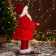 Santa Claus "in a red fur coat with a belt, with a flashlight" 25x45 cm